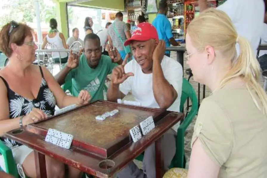 12. Experience a Local Colmado and Play Dominoes