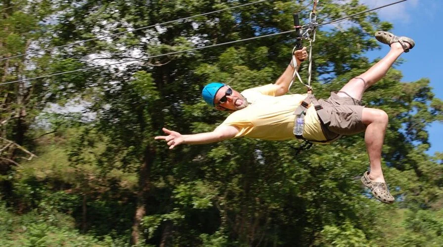 3. Zipline Over Lush Canopies - Top 10 things to Do in Amber Cove