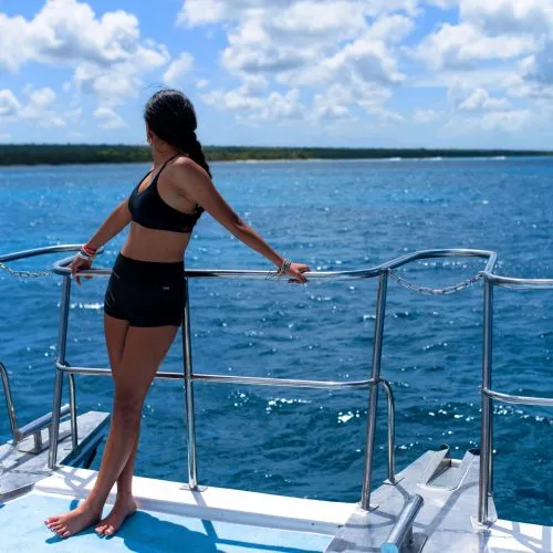 11 - Happy guest enjoy beautiful views of Punta Cana on our catamaran Punta Cana isla saona tour