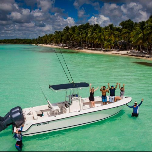 11 - Happy guest enjoy views of Isla Saona and doing snorkeling on our private palmilla and isla saona catamaran tour