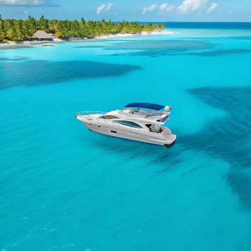 12 - Guest enjoying beautiful scenes and views of Punta Cana on our Private Yacht majesty 56 Punta Cana tour