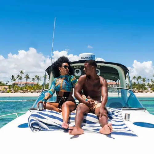 2 - Beautiful couple enjoy charming views of Punta Cana and make memories on our private yacht Bavaro Punta Cana tour
