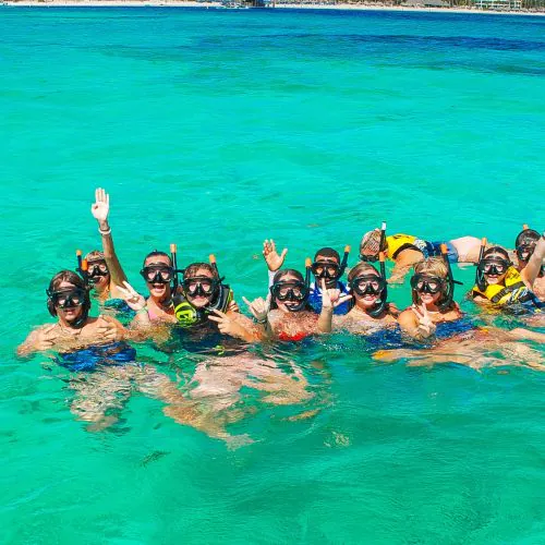 4 - Guest enjoying snorkeling in crystal Punta Cana waters on our private catamaran Delux Punta Cana tour