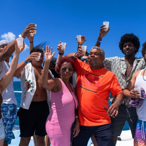 4 - Happy guests group having alot of fun and enjoy drinks on our Isla Soana catamaran tour
