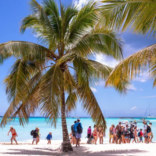 6 - Happy guest enjoy on beach and see the views of Isla Soana on our Isla Soana catamaran tour