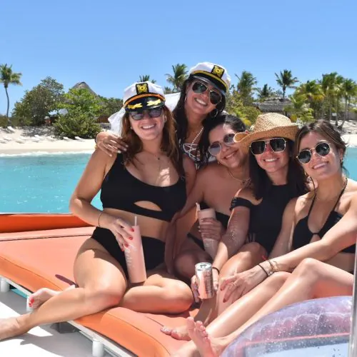 6 - Happy guests enjoy drinks and views of Punta Cana on our private yacht to Saona Island tour