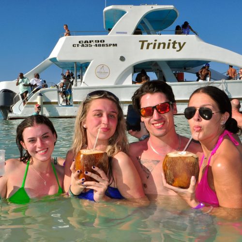 6 - Happy guests enjoy snorkeling with drinks on our private catamaran Delux for large groups tour-min