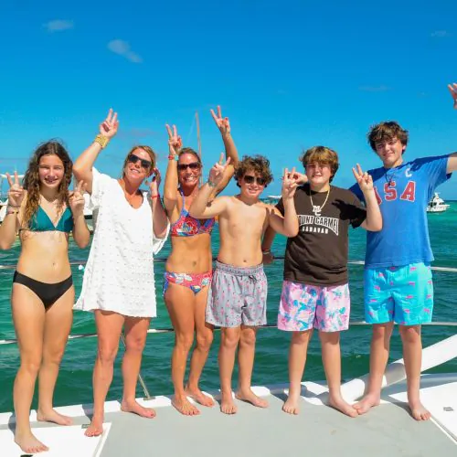 9 - Beautiful family with kids having alot of fun and making memories on our private catamaran Delux Punta Cana tour