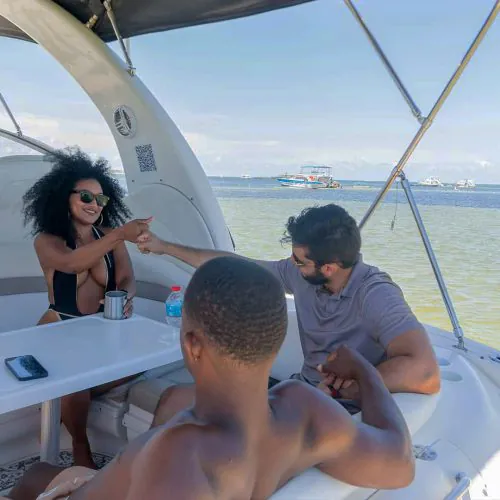 9 - Happy guest playing games while enjoy views of Punta Cana on our private yacht Bavaro Punta Cana tour