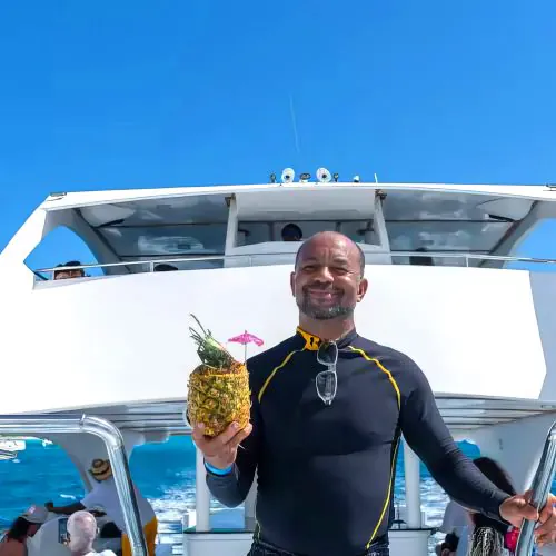enjoy drink on private isla saona catamaran tour